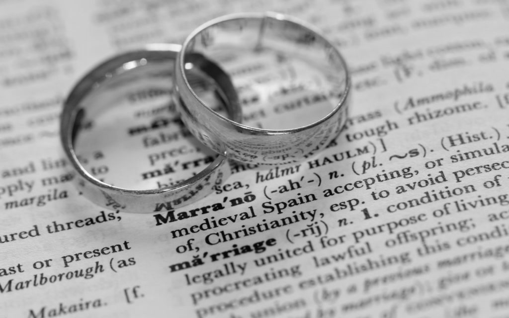 Photo of two wedding rings.  Are you eligible for marrigae alloweance?